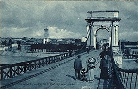 La passerelle Seguin (vers 1900) ; construite à partir de 1827, elle sera remplacée par un pont en pierre en 1905.