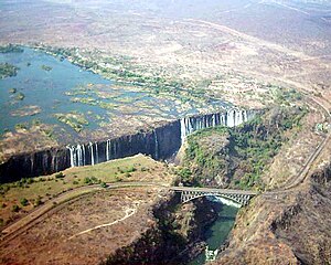 Railway bridge between Zambia and Zimbabwe at Victoria Falls Victoria Falls aerial view September 2003.jpg