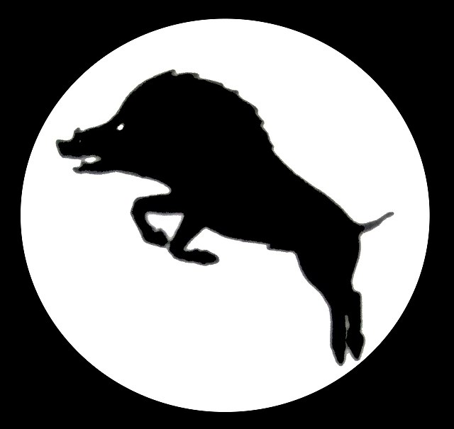 XXX Corps formation badge; a rampant boar