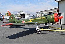 The Aerostar Yak-52TW N699DP in 2016, which was modified to resemble a Spitfire for the film Yakolev Yak52TW 'N699DP' (26134347593).jpg