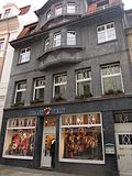 Residential building with shop, in a closed area