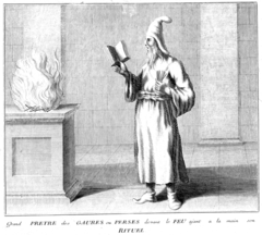 A Zoroastrian priest reads from a book while performing a sacrifice, Bernard Picart (1673–1733).