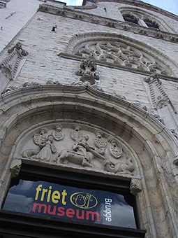 The entrance to the museum 'Frietmuseum (Fries Museum) located in the Gothic Saaihalle (former Wool Hall) at Vlamingstraat 33' by Tania Dey.JPG