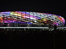 Dalian Sports Centre Stadium at night Da Lian Ti Yu Zhong Xin Ti Yu Guan .jpg