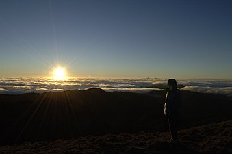 Man watching sunrise