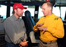 Norris during a meeting with USS Theodore Roosevelt (CVN-71) commanding officer Captain J. R. Haley, in June 2005 050624-N-5248R-002.jpg
