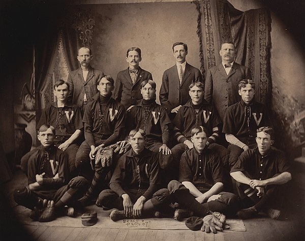 Jackson (middle row, second from left) with the 1907 Victor Mills team