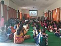 Participants watching documentary in Women's Day Workshop