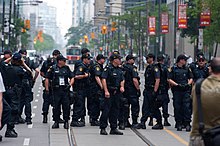 Ontario Provincial Police officers forming a line during the 2010 G20 Toronto summit protests 2010 G20 Toronto.jpg