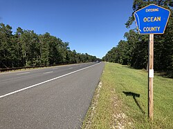 2018-09-16 15 25 28 View north along New Jersey State Route 444 (Garden State Parkway) between Exit 50 and Exit 58, entering Little Egg Harbor Township, Ocean County from Bass River Township, Burlington County in New Jersey.jpg