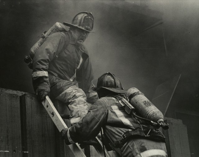 Firefighters are exposed to risks of fire and building collapse during their work.