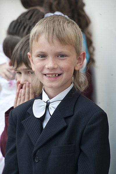 File:A boy poses for a photograph during a graduation ceremony at Birdik Village School at Transit Center at Manas, Kyrgyzstan, May 25, 2013 130525-F-LK329-017.jpg