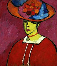 Nő széles karimájú kalapban (1910)