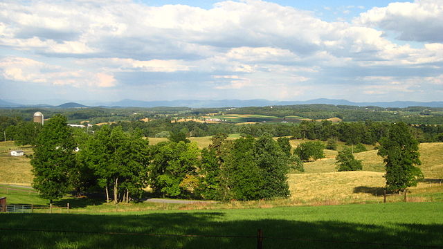 View of Augusta County countryside across the Shenandoah Valley toward the Blue Ridge Mountains.