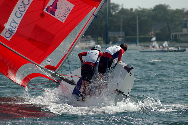 A team at the 2005 ISAF Team Racing World Championship narrowly avoids capsizing.