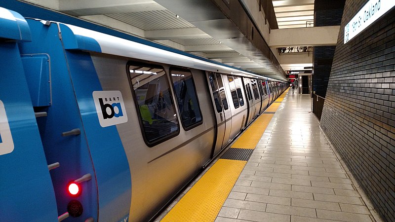 Locals and tourists alike often go to places by a BART train.