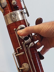 Bassoon showing right hand on handrest in playing position