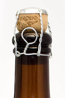 Muselet Wire cage to secure corked bottles of carbonated beverages