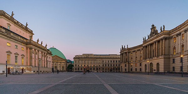 General view of the Bebelplatz, taken from Unter den Linden with the State Opera to the left, St. Hedwig's Cathedral center-left, the Old Library (Alt