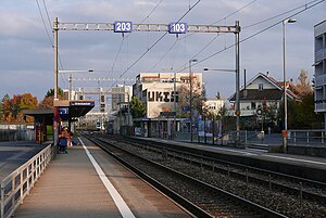 Double-track railway line with side platforms