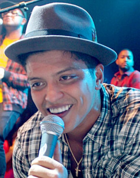 Bruno Mars (pictured), who co-wrote "Lift Off", was rumored to be featured on the track.