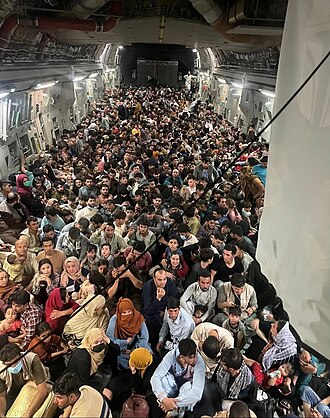 A C-17 evacuating 823 passengers out of Kabul on 15 August C-17 carrying passengers out of Afghanistan.jpg