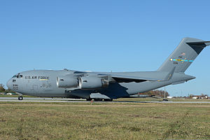 Cargo pallets slide off the ramp of a U.S. Air Force C-17A Globemaster III aircraft assigned to the 3rd Airlift Squadron, 436th Airlift Wing during a combat offload training scenario Nov. 6, 2013, at Dover Air 131106-F-VV898-182.jpg