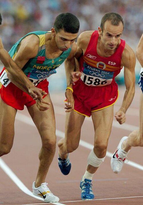 Current mile world record holder Hicham El Guerrouj (left) at the start of a race