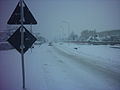 Castelverde: the SS498 regional road when passing through the town, during a snowfall.