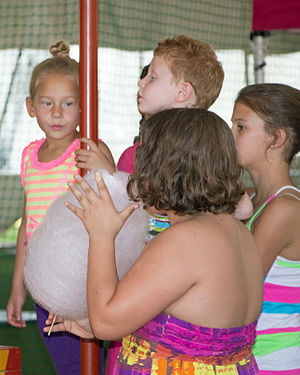 Children with various hair colours and styles (includes a girl with blonde hair in a bun hairstyle, a boy with short strawberry blonde hair and a girl with brown hair in a bob haircut)