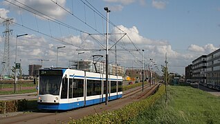 Line 26 running beside IJburglaan on Steigereiland