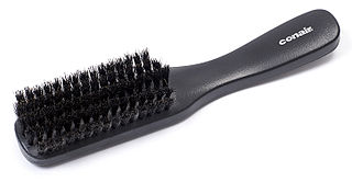 Hairbrush stick brush with rigid or soft bristles used in hair care