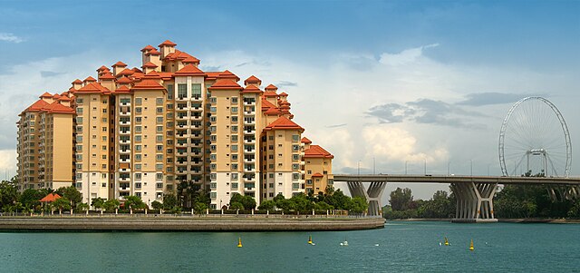 Image: Condos and the Singapore Flyer by the Kallang River