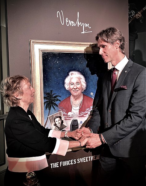 File:Dame Vera Lynn's daughter Virginia Lewis-Jones and Ross Kolby in front of his portrait of Lynn at the unveiling ceremony at the Royal Albert Hall on 13th January 2020.jpg