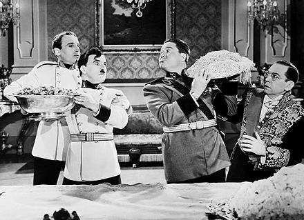 Henry Daniell (left) in Chaplin's The Great Dictator with Charlie Chaplin, Jack Oakie and Carter DeHaven