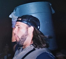 Droese carrying a garbage can to the ring in 1994. Duke Droese in 1994.jpg