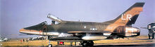 North American F-100D-90-NA Super Sabre, AF Ser. No. 56-3213 of the 492d TFS in Southeast Asia camouflage motif. Note the squadron colors being removed, being replaced by the "LR" tailcode. F-100d-56-3213-492tfs-48fbw.jpg