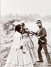 Another still showing (from left) actresses Cooper and Nilsson confronted by George B. Hoyt in costume as a Federal soldier Film still of three performers in 1912 Kalem production "Battle of Pottsburg Bridge".jpg