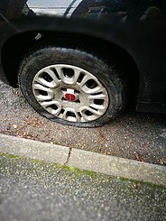 A flat tire on an Fiat Panda automobile Flat tire on a Fiat Panda.jpg
