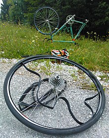 Replacing a punctured inner tube on a road bicycle Flat tire on bicycle.jpg