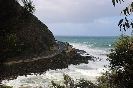 Winding road clinging to the ocean