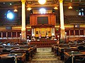 "IowaStateCapitolHouseChamber.jpg" by User:Parkerdr