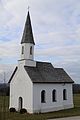 Petzgersdorf; Kapelle; Satteldachbau mit Dachreiter mit Spitzhelm und Rundbogenfenstern, neuromanisch, 1849 erbaut, 1854-55 erweitert; mit Ausstattung. This is a picture of the Bavarian Baudenkmal (cultural heritage monument) with the ID D-1-87-167-22 (Wikidata)