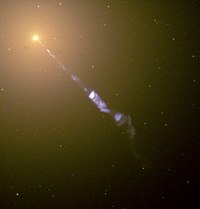 A jet of particles is being emitted from the core of the elliptical radio galaxy M87. M87 jet.jpg