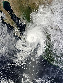 Satellite image of Hurricane Manuel (2013), the costliest tropical cyclone on record in the Northeastern Pacific, making landfall in northwestern Mexico