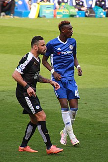 Wasilewski playing for Leicester City in a league match against Chelsea at Stamford Bridge on 15 May 2016 Marcin Wasilewski, Tammy Abraham.jpg