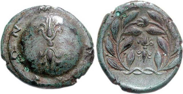 Coin of Molossi, 360–330/25 BC. Obverse: Vertical thunderbolt on shield, ΜΟΛΟΣΣΩΝ (of Molossians) around shield. Reverse: Thunderbolt within wreath.