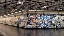 Milenko's mosaics on the walls of the linkway between the North South and North East lines as part of his and his wife Delia's artwork Interchange NE6 Dhoby Ghaut Art in Transit.jpg