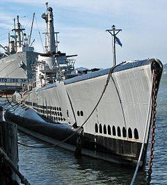 Photograph of the USS "Pampanito" at dock as a museum ship. The liberty ship SS "Jeremiah O’Brien" is moored in the background.