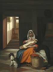 Intérieur avec une femme qui allaite un enfant